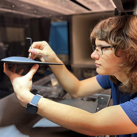 Student works with wind tunnel